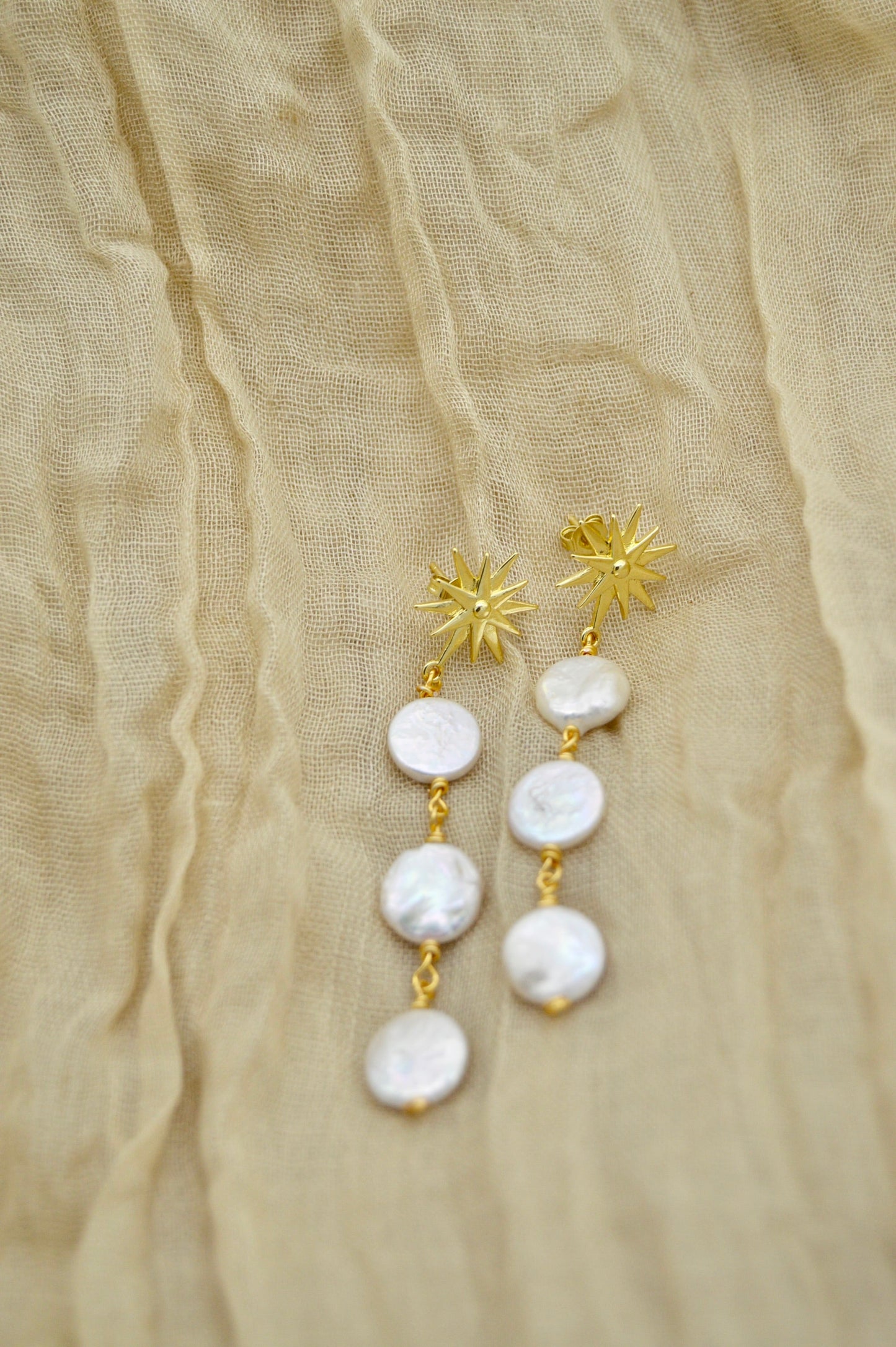 The Ezra Star Pearl Dangle Earrings Alma Collective