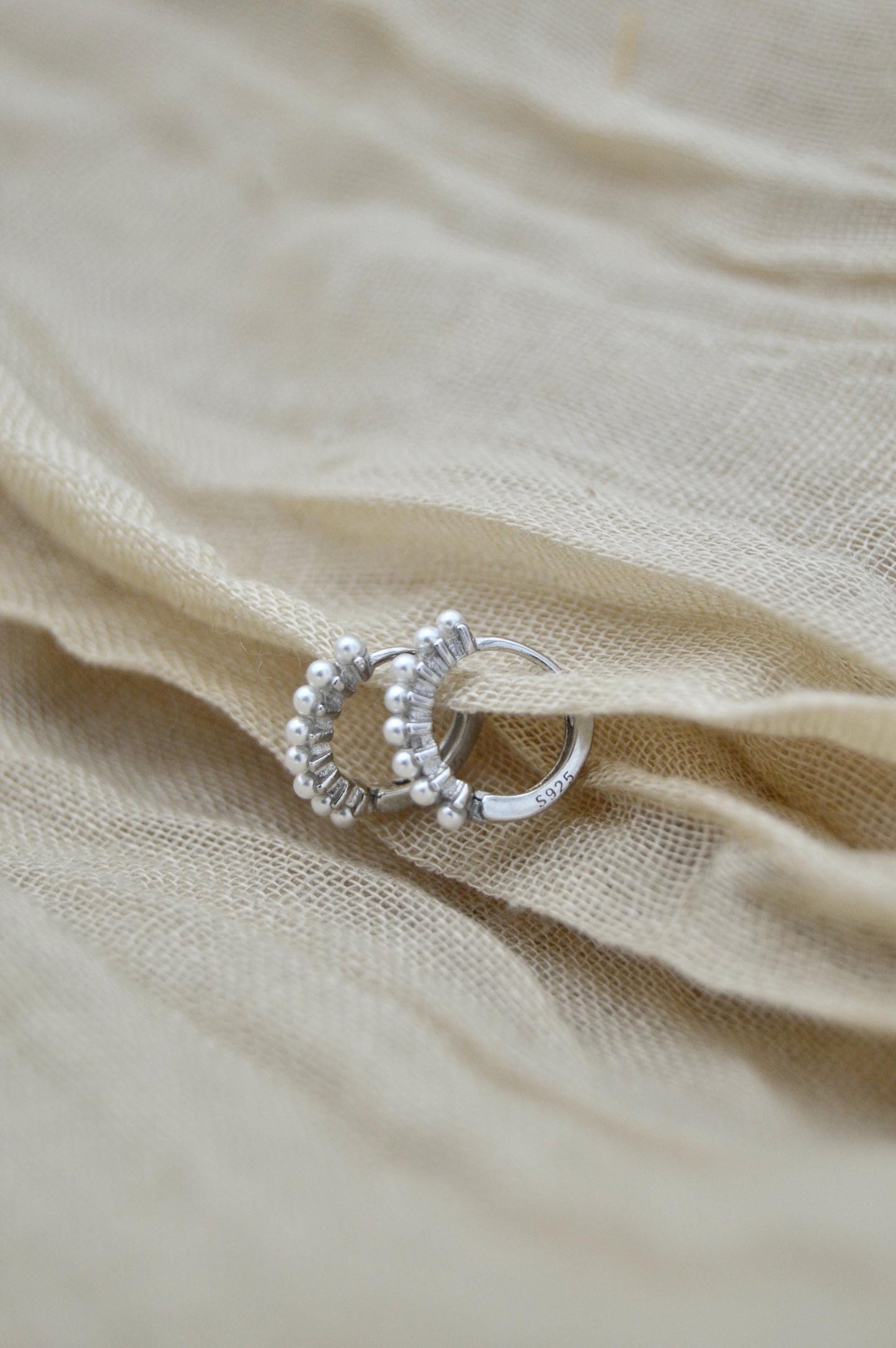 Pearl Huggie Earrings Close Up