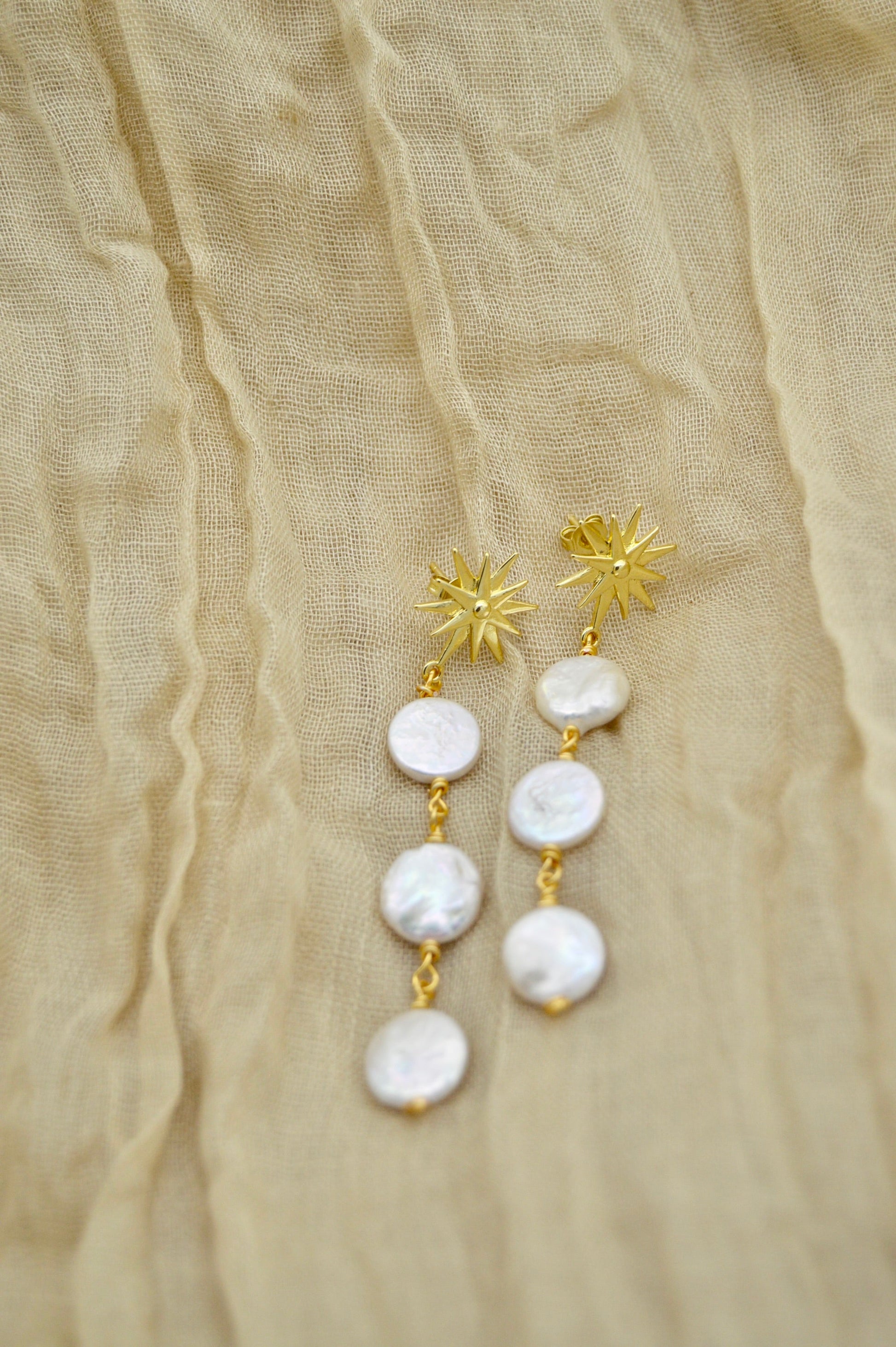 The Ezra Star Pearl Dangle Earrings Alma Collective
