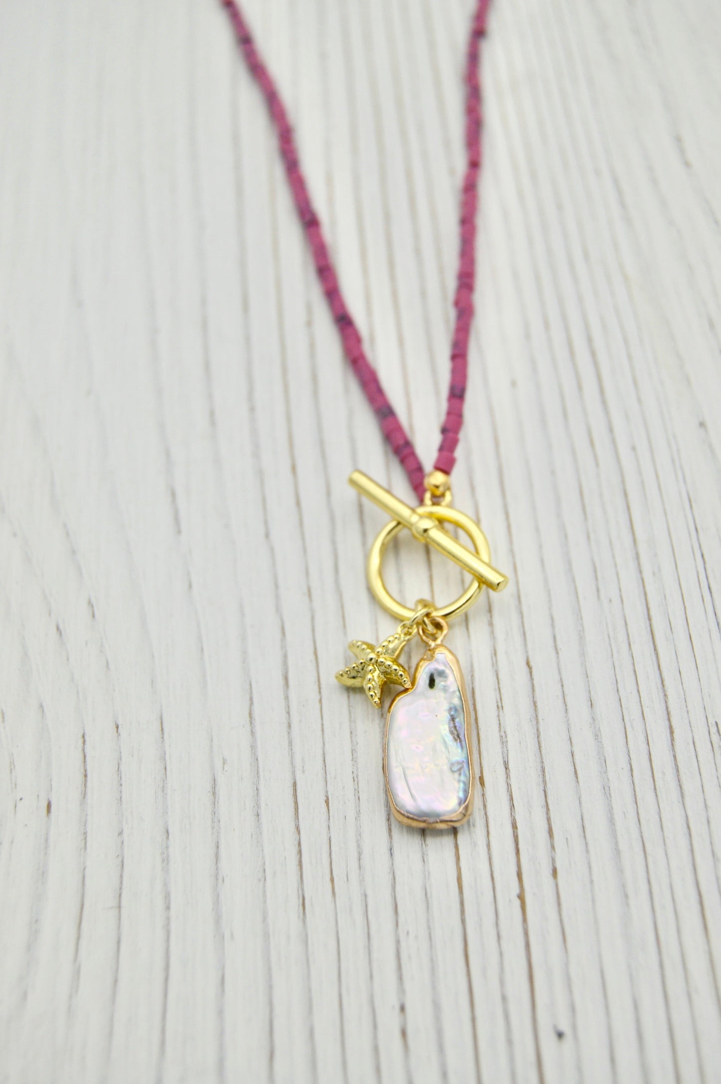 The Lorelei Pearl Starfish Necklace Alma Collective