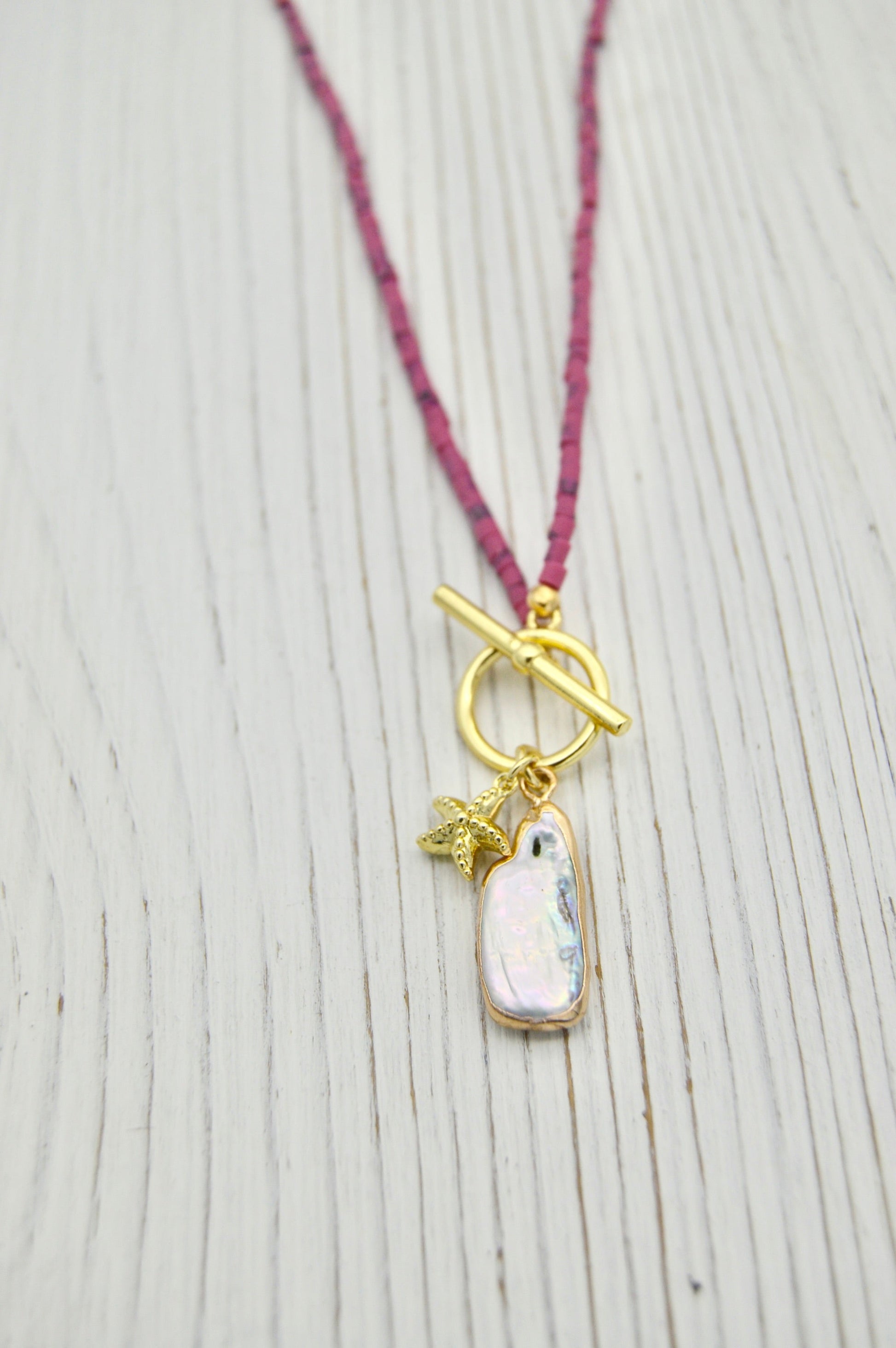 The Lorelei Pearl Starfish Necklace Alma Collective