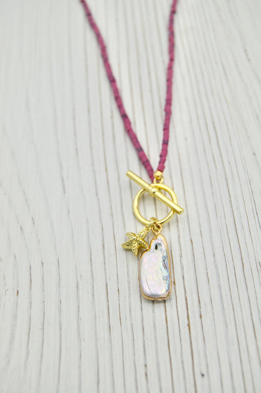 The Lorelei Pearl Starfish Necklace Alma Collective
