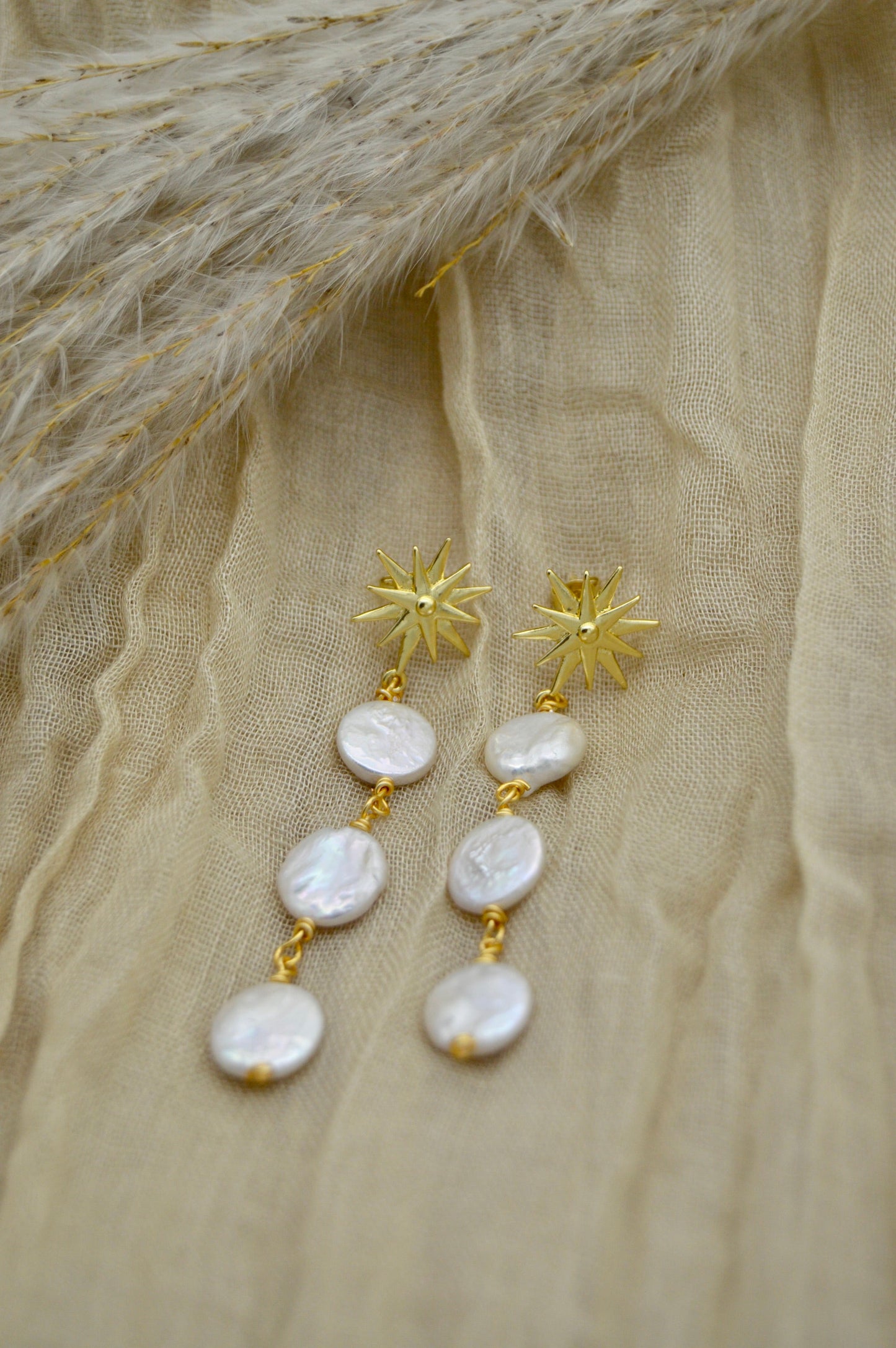 The Ezra Star Pearl Dangle Earrings Alma Collective