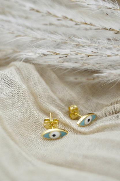 The Ojo Evil Eye Stud Earrings Alma Collective