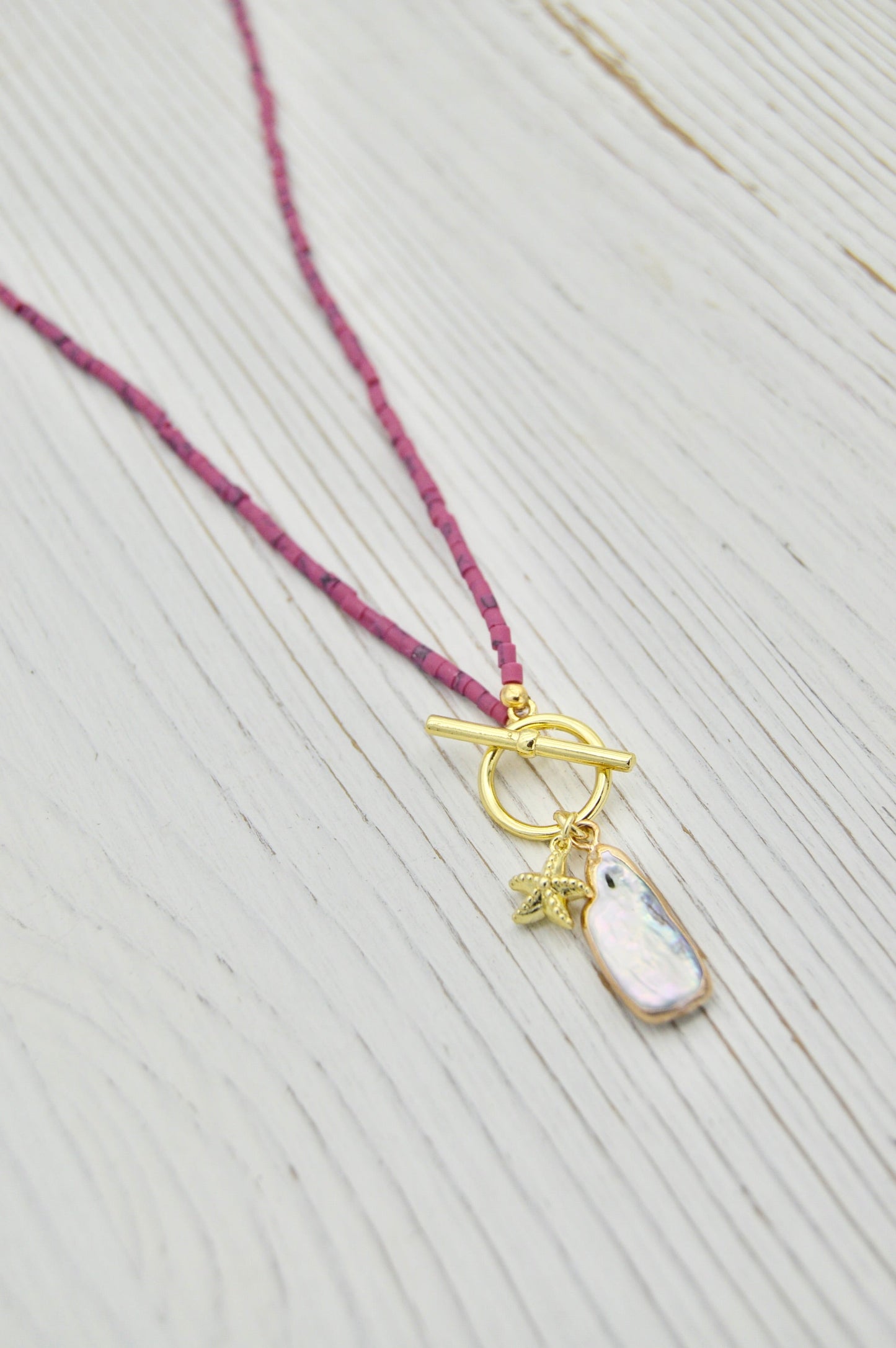 The Lorelei Pearl Starfish Necklace Alma Collective