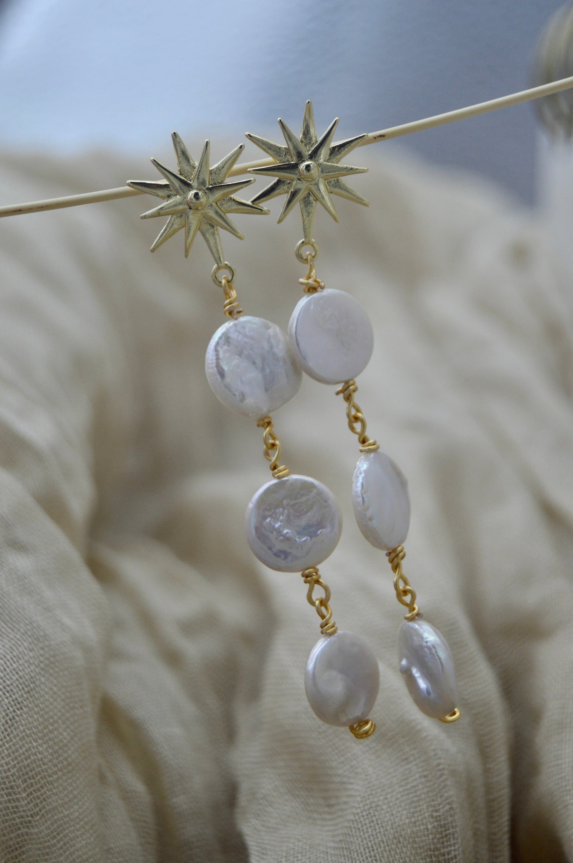 The Ezra Star Pearl Dangle Earrings Alma Collective