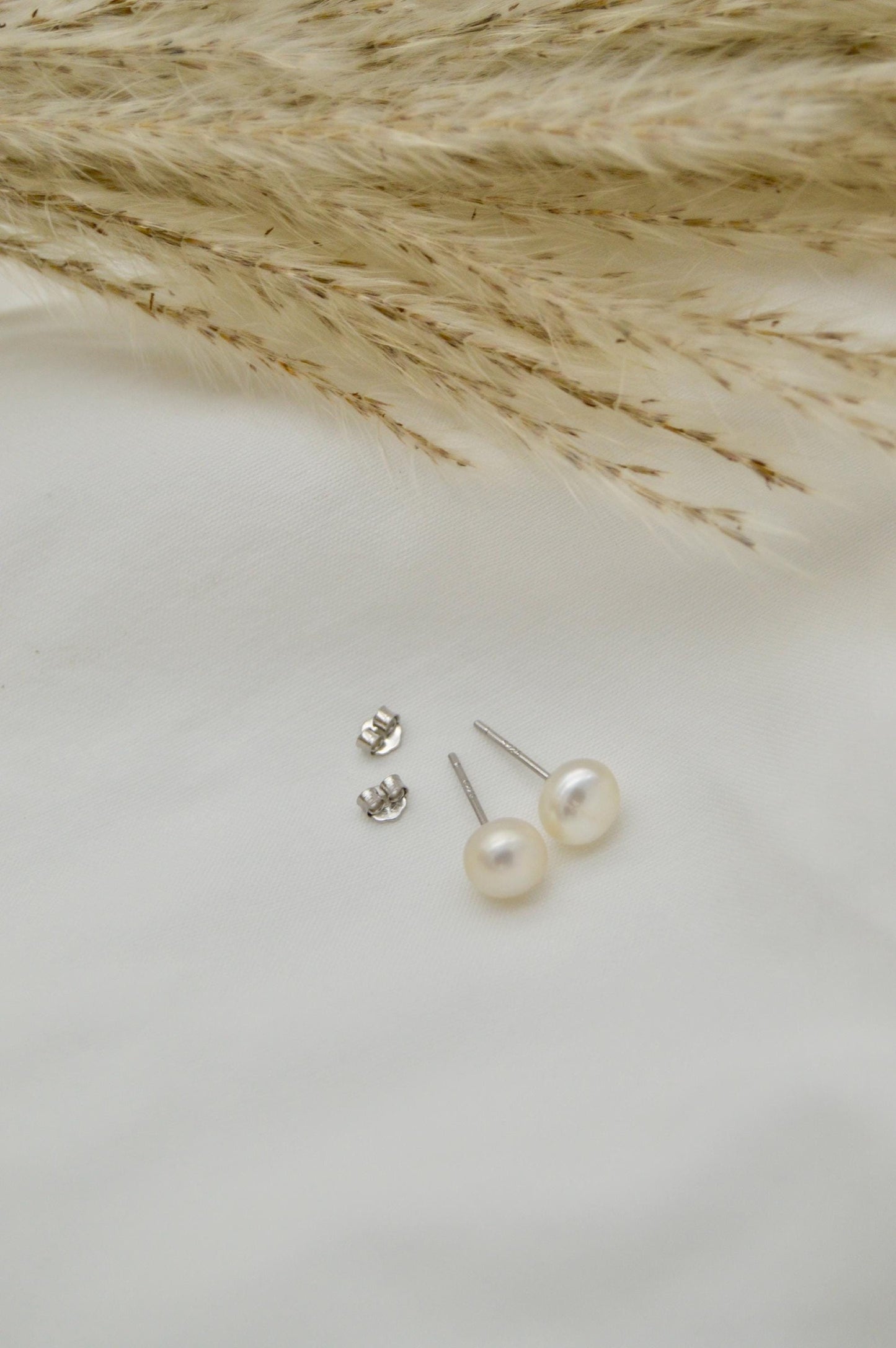 Baroque Pearl Stud Earrings Flatlay
