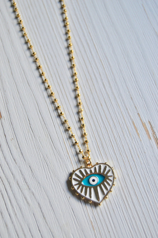 Evil Eye Heart Necklace Flatlay