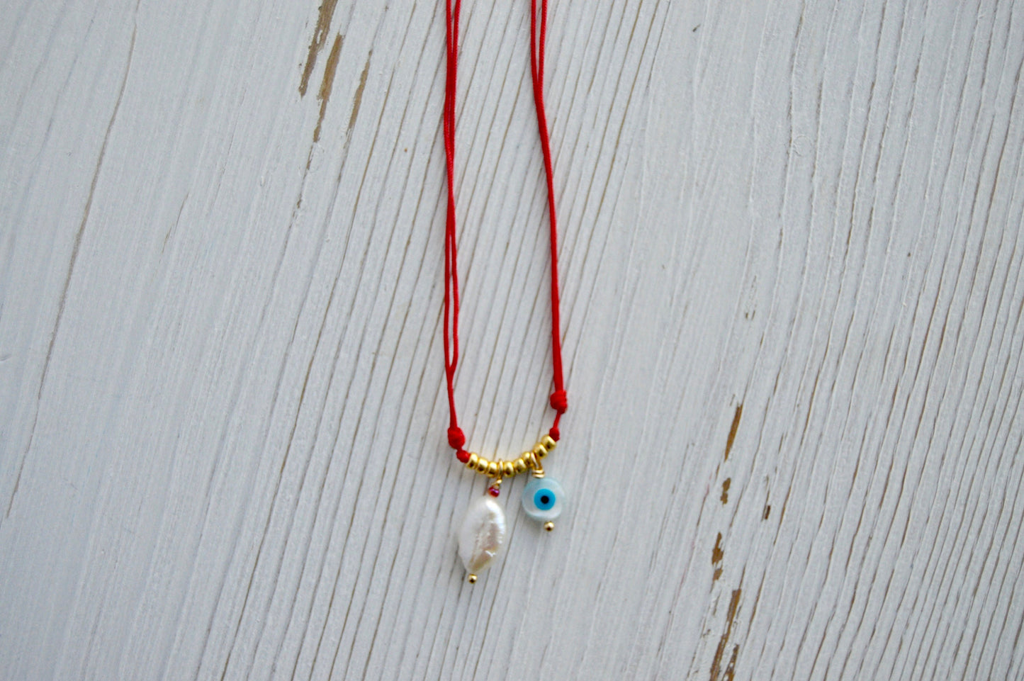 Evil Eye Necklace Flatlay