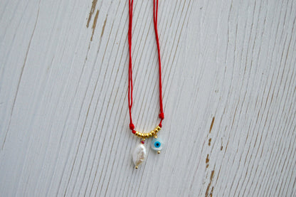 Evil Eye Necklace Flatlay