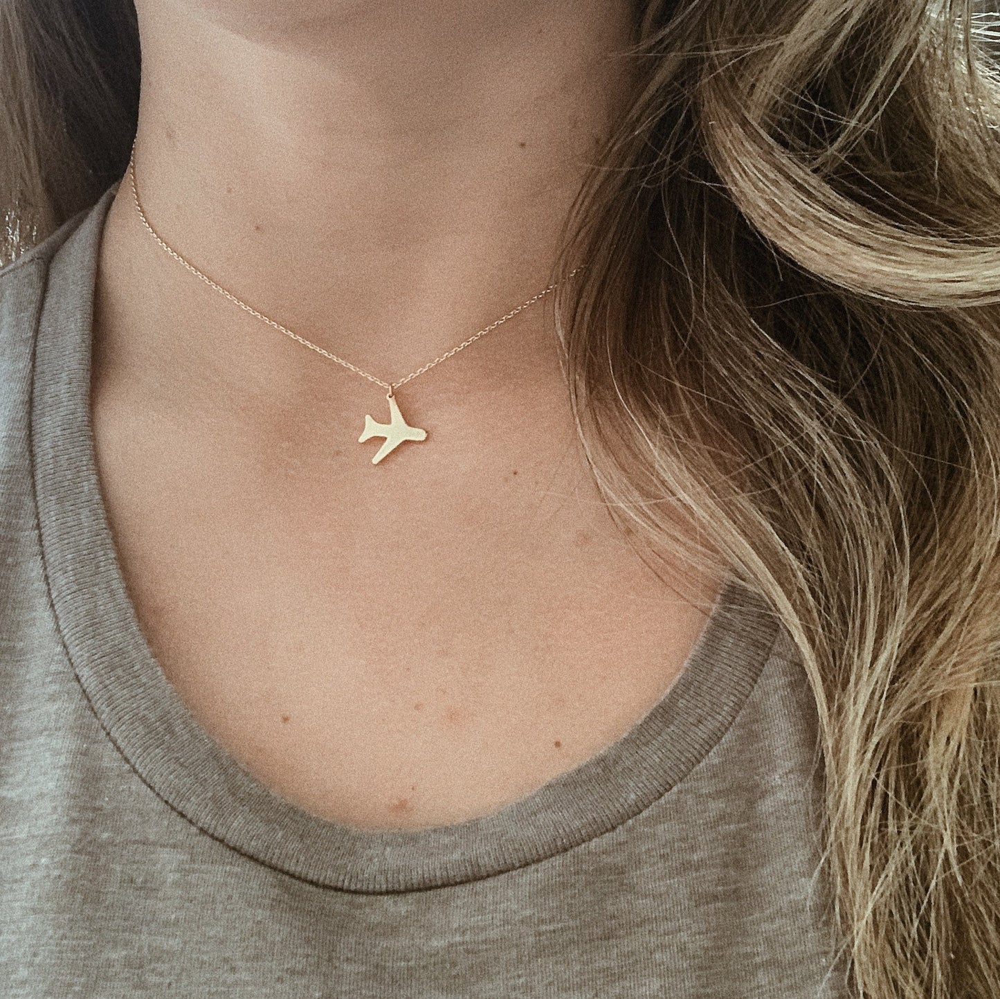 Gold Airplane Necklace Model