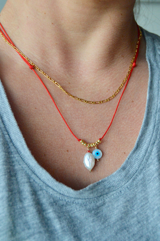 Evil Eye Pearl Necklace Close Up