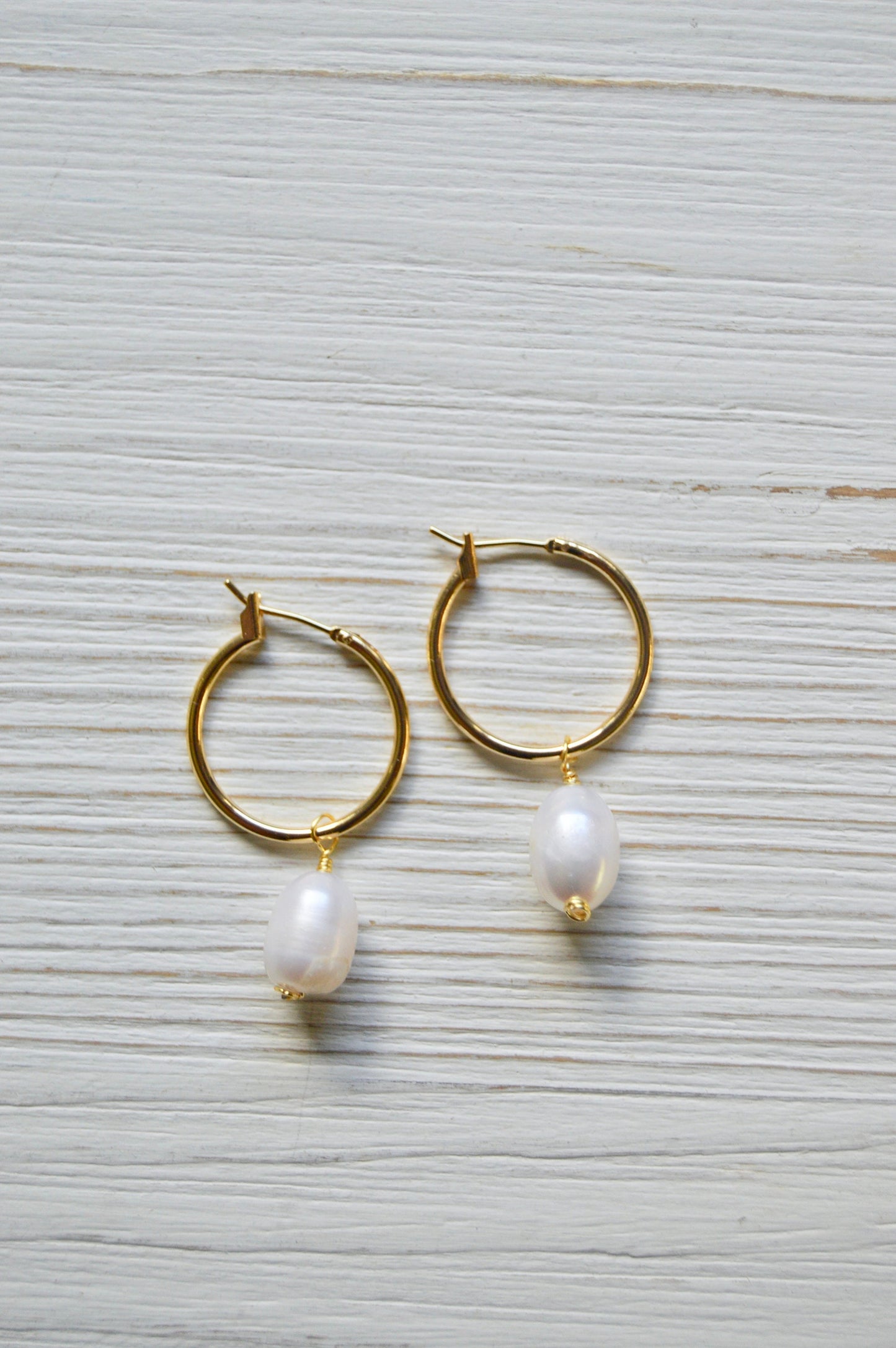 The Maris Pearl Hoop Earrings Flatlay