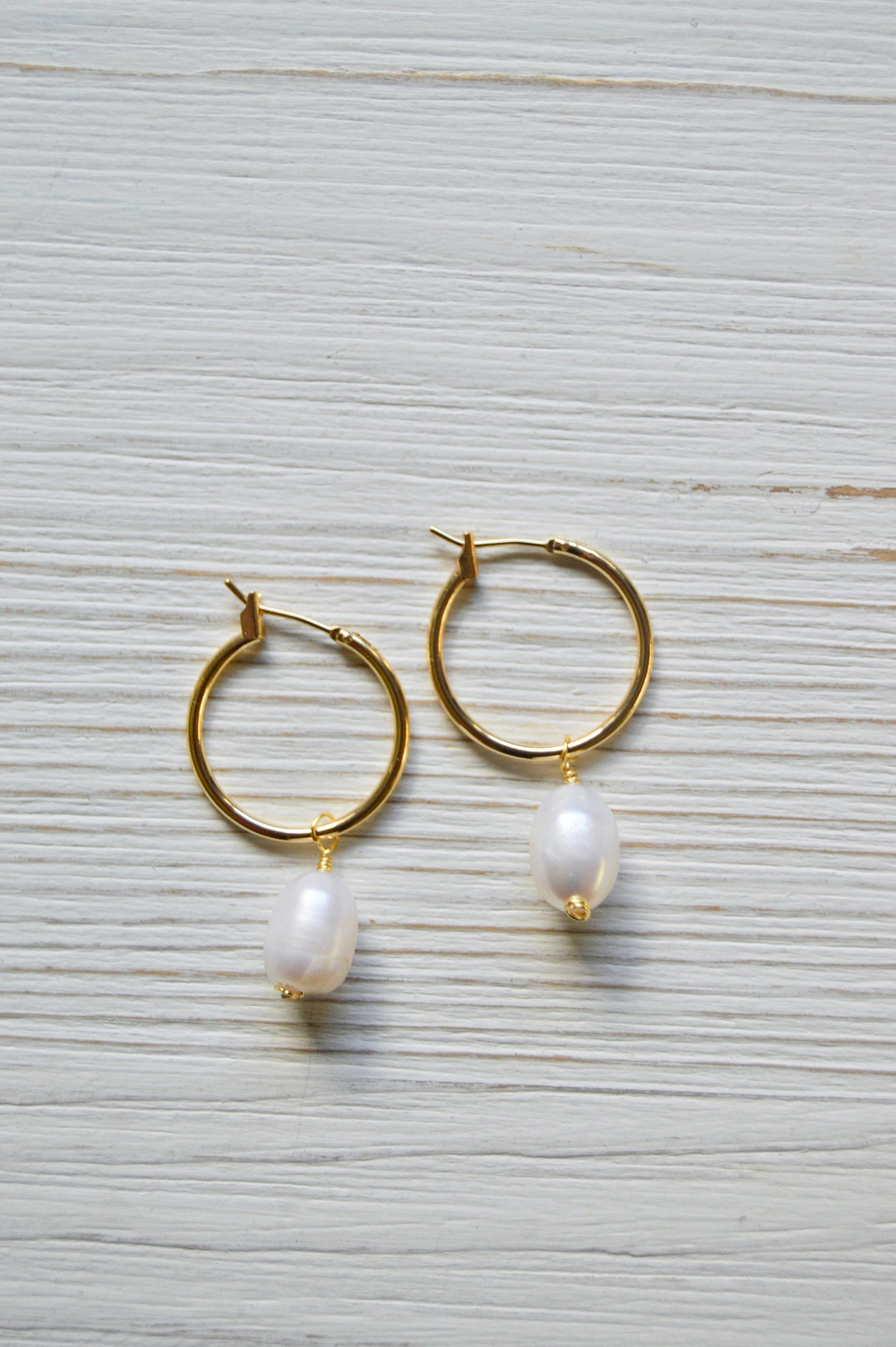 The Maris Pearl Hoop Earrings Flatlay